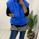 Bright blue gilet with matching bag